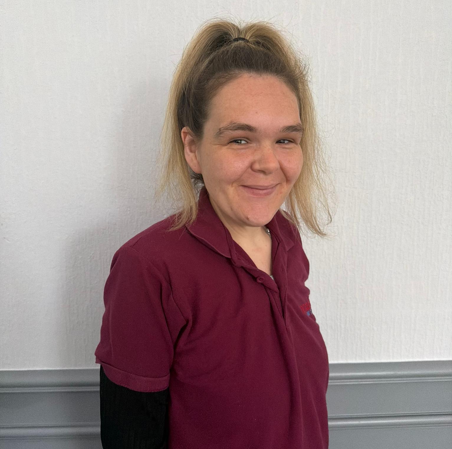 support worker with blonde ponytail