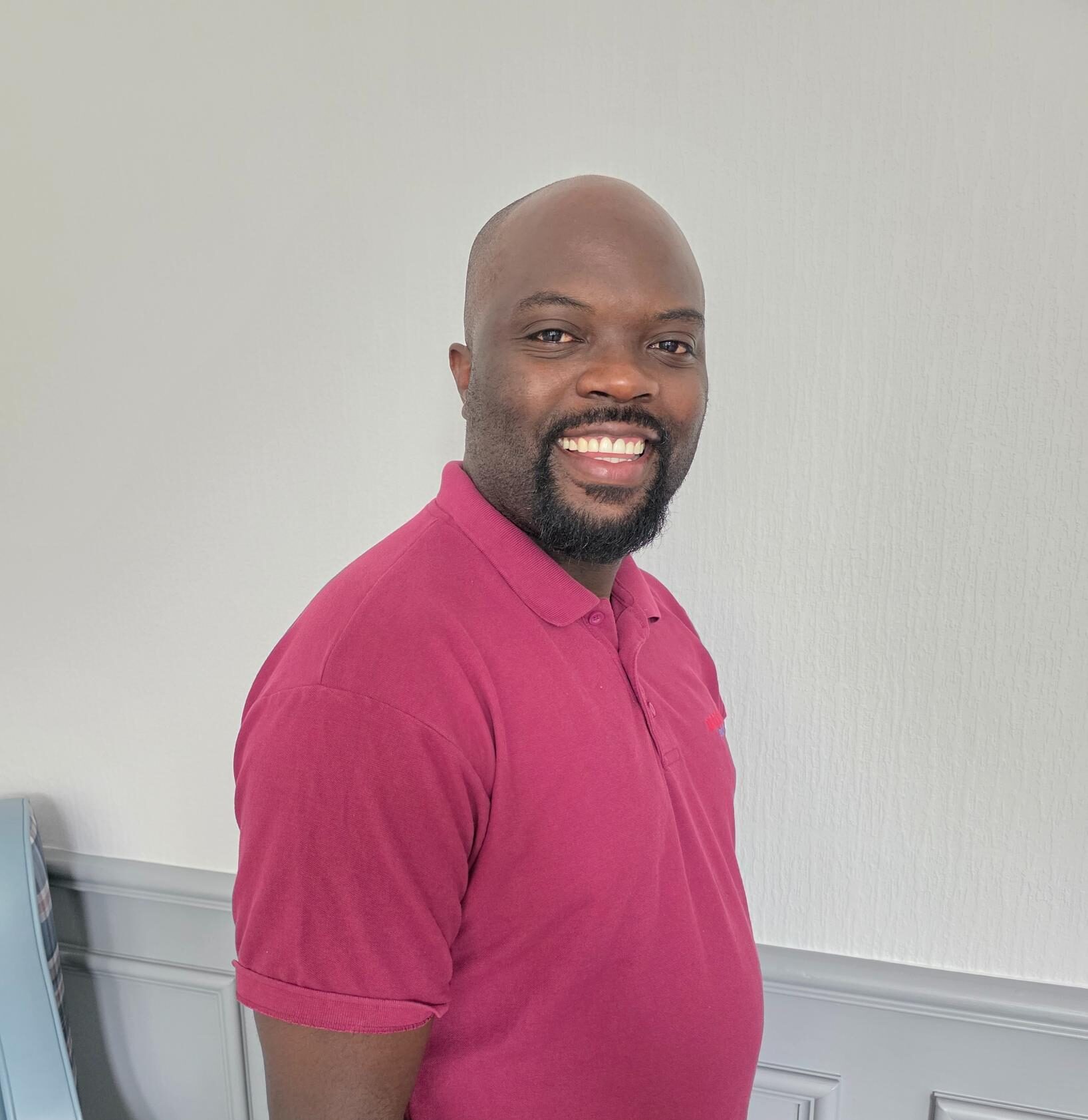 night support worker in pink uniform