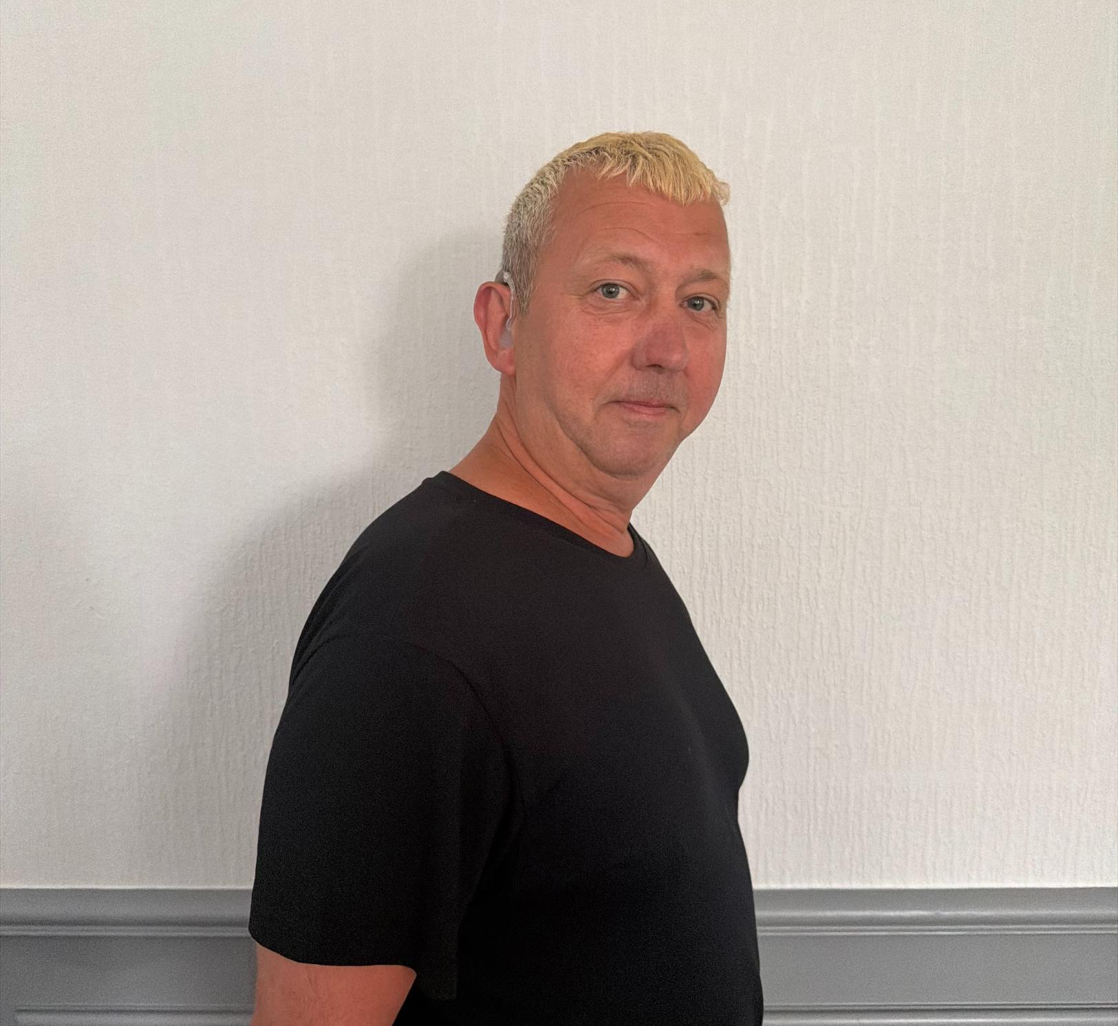 kitchen assistant in black t shirt
